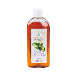 Honig Bier Shampoo in einer durchsichtigen Flasche mit weißem Klappdeckel