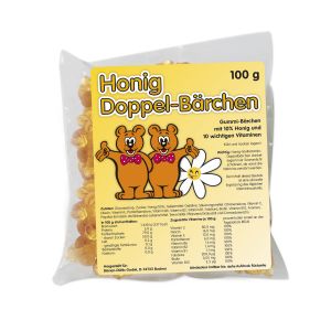 Gelbe Honig Gummibärchen in einer durchsichtigen Plastik Verpackung